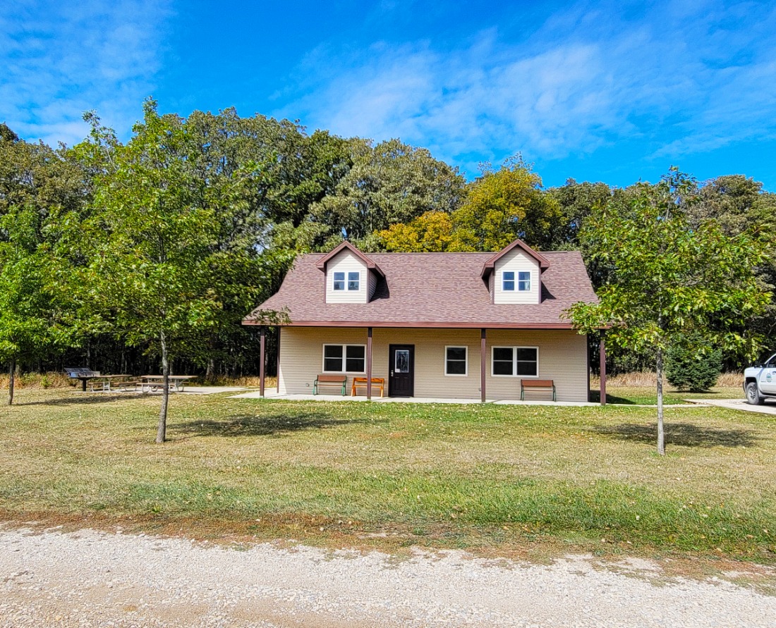 Family Cabin-Outside facility showing front patio, driveway, and firepit patio