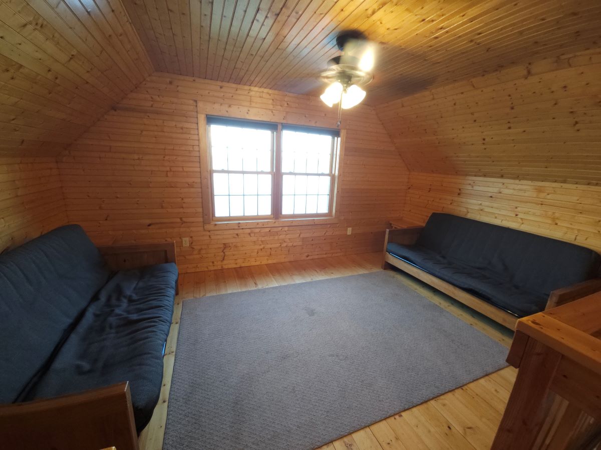 Lakeview cabin upstairs with two full size futons over the front porch