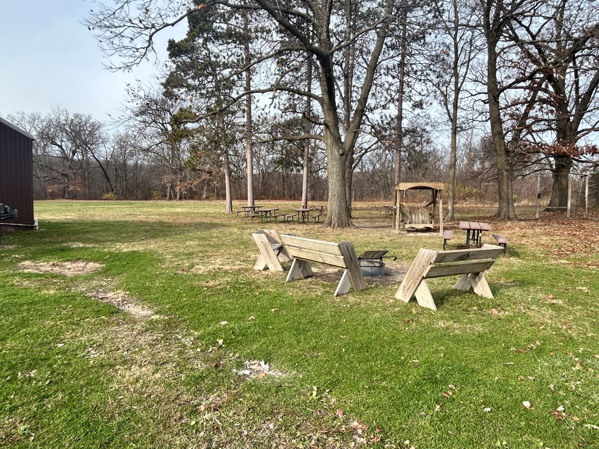 Langwood Education Center lodge campfire ring with benches