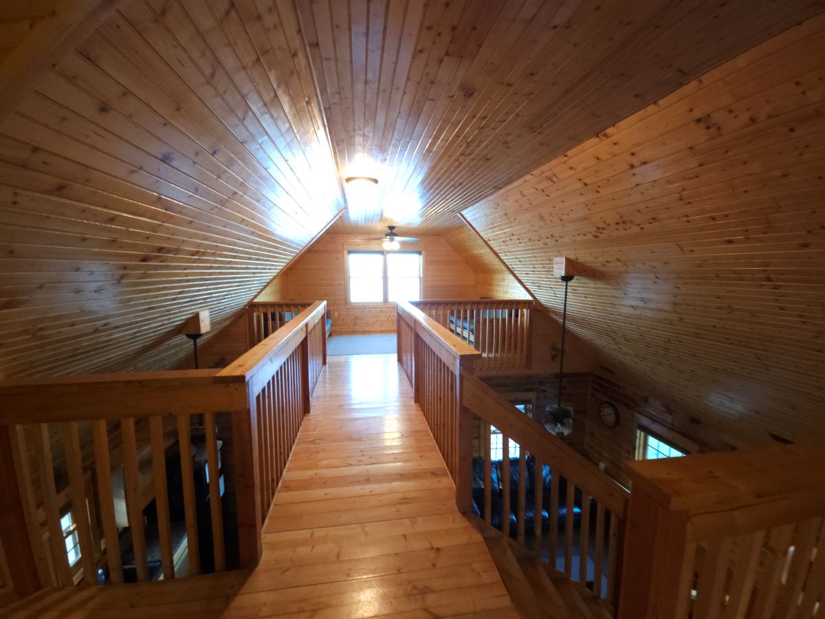 Lakeview cabin upstairs loft cat walk with full size futons in the background