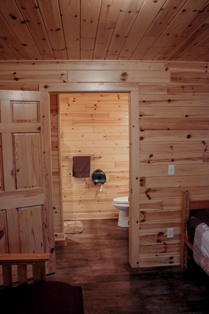 Cabin door to basement bathroom 