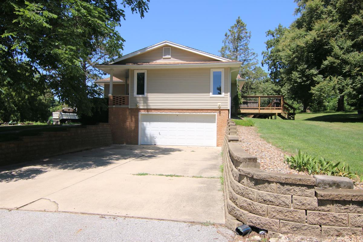 TM driveway and garage off to the side