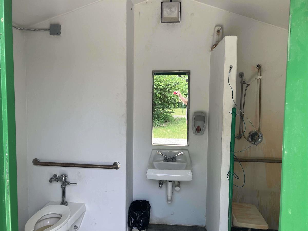 Bath Facilities at Siems Park with Toilet, Sink, and Shower