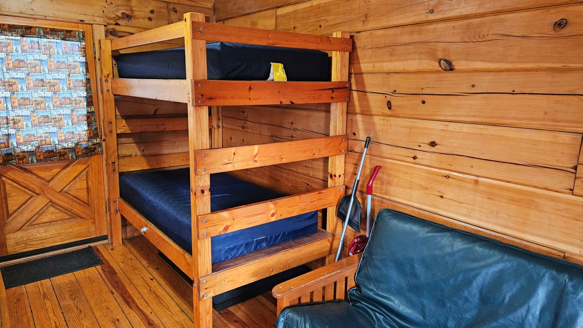 Cabin 1 with bunk bed and door to the deck