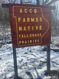 Entrance sign to Farm 55 which is a Native Tallgrass Prairie. 