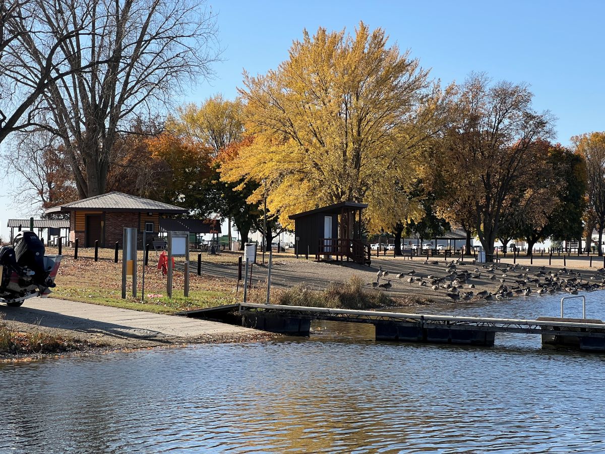 Mill Creek campground amenities of fishing lake, walking trails and a playground