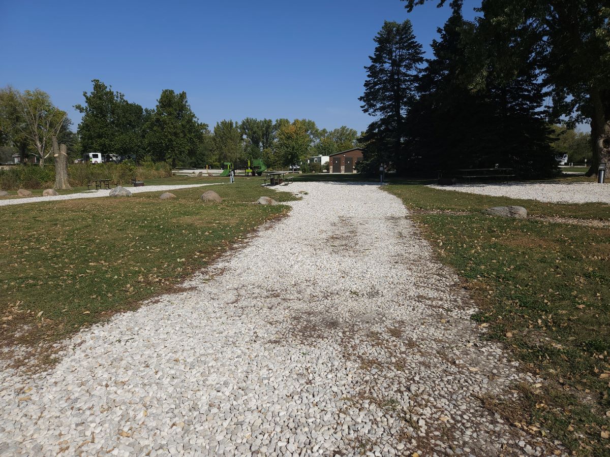 Site 25 – Shows Back-in site, pedestal/hook up and picnic area